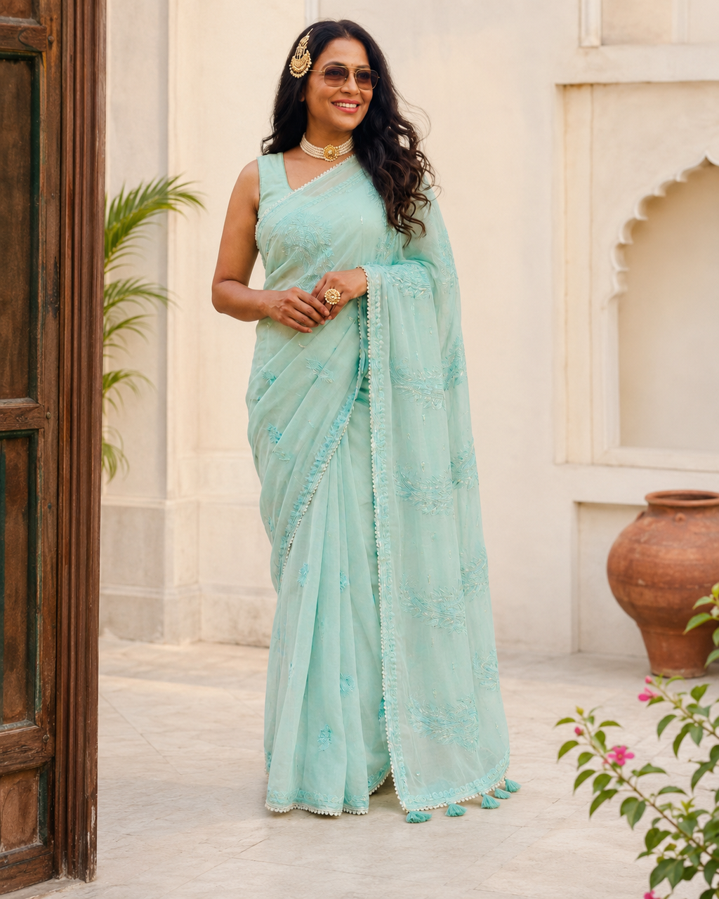 Sage green Georgette Saree with Intricate Embroidery & Tassel Pallu